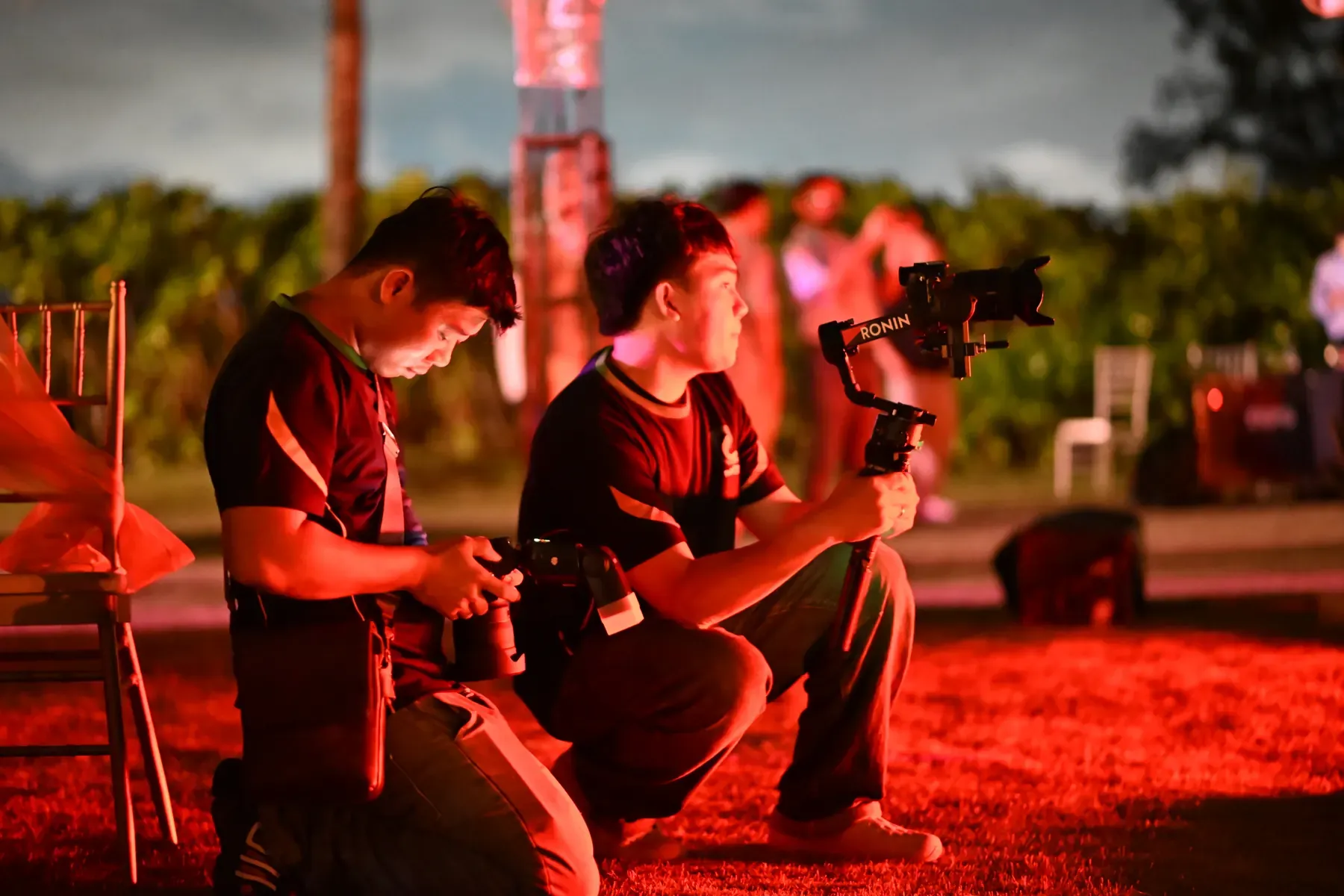 Two Phu Quoc Times Media camera operators preparing a shot.
